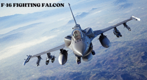 Top Fighter Jets 2025: The World's Most Advanced Aircraft 1 An F-16 Fighting Falcon jet flies over mountainous terrain, equipped with missiles and bombs, showcasing its advanced military capabilities.