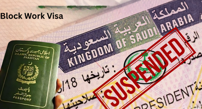 A Pakistani passport in hand with a Saudi work visa stamped 