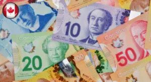 A colorful assortment of Canadian banknotes featuring various denominations, showcasing their distinct designs and colors.