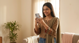 Young Pakistani woman creating social media content on her smartphone. Young Pakistani woman creating social media content on her smartphone.